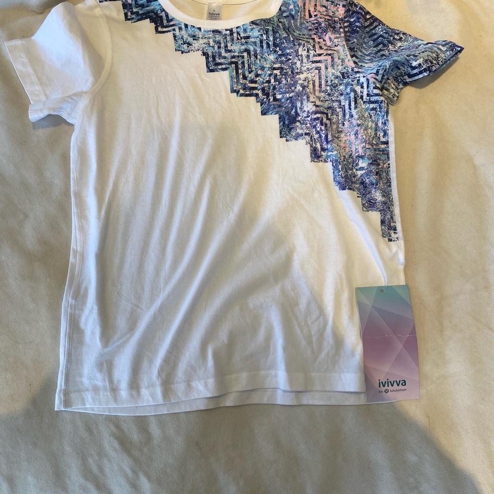 Ivivva girls white tee with design. Size 12
